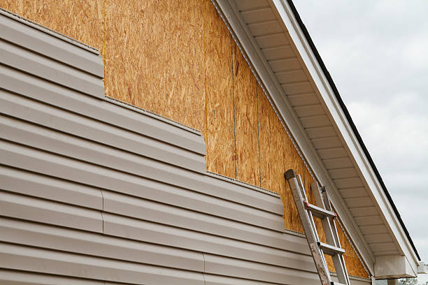 Professional Storm Damage Siding Repair technician working in Mars, PA